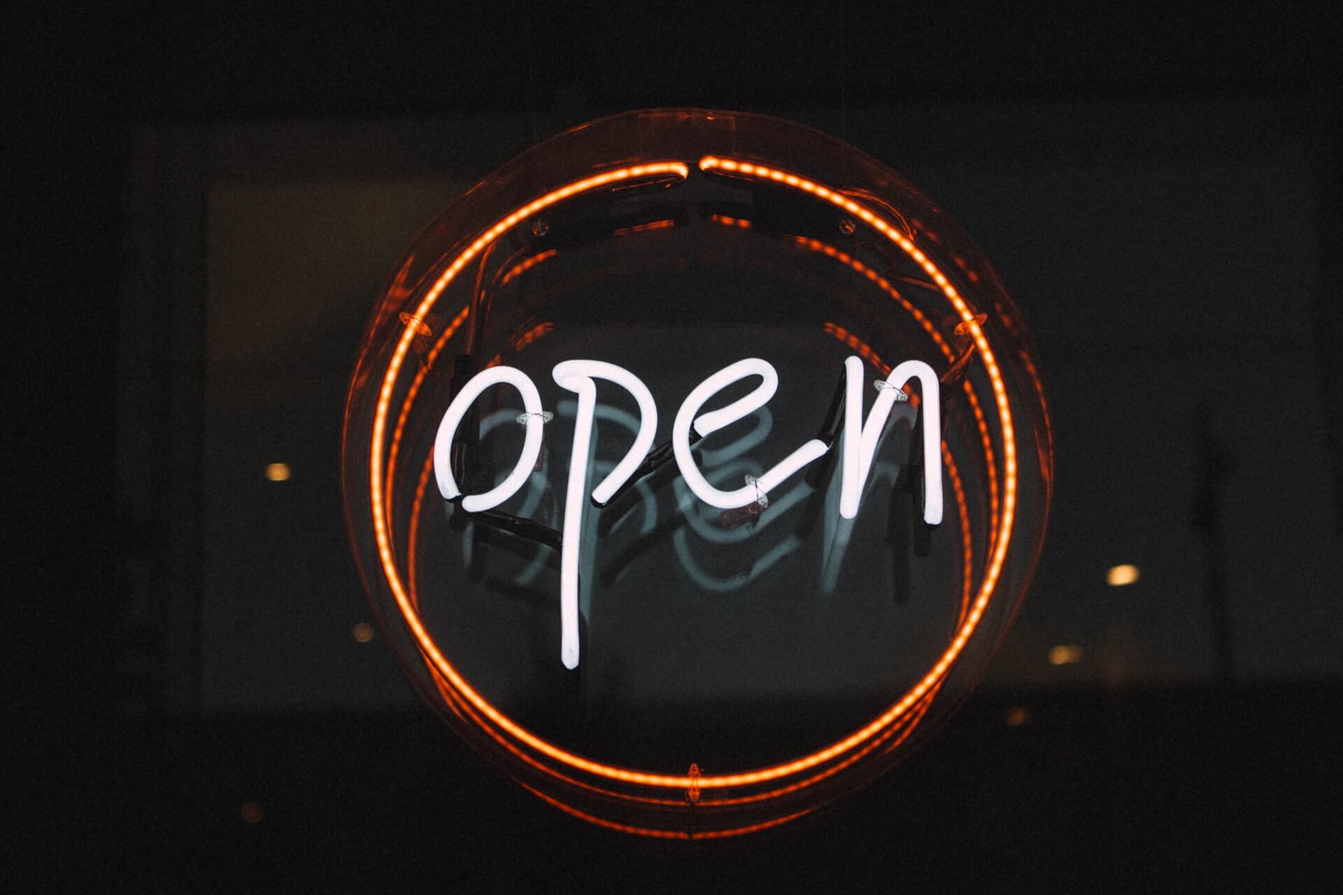 Lower-case neon open sign