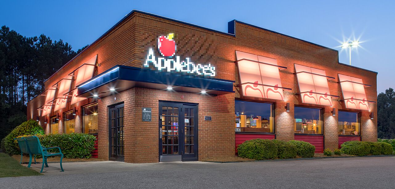 Applebee's restaurant with censored, pixelated sign