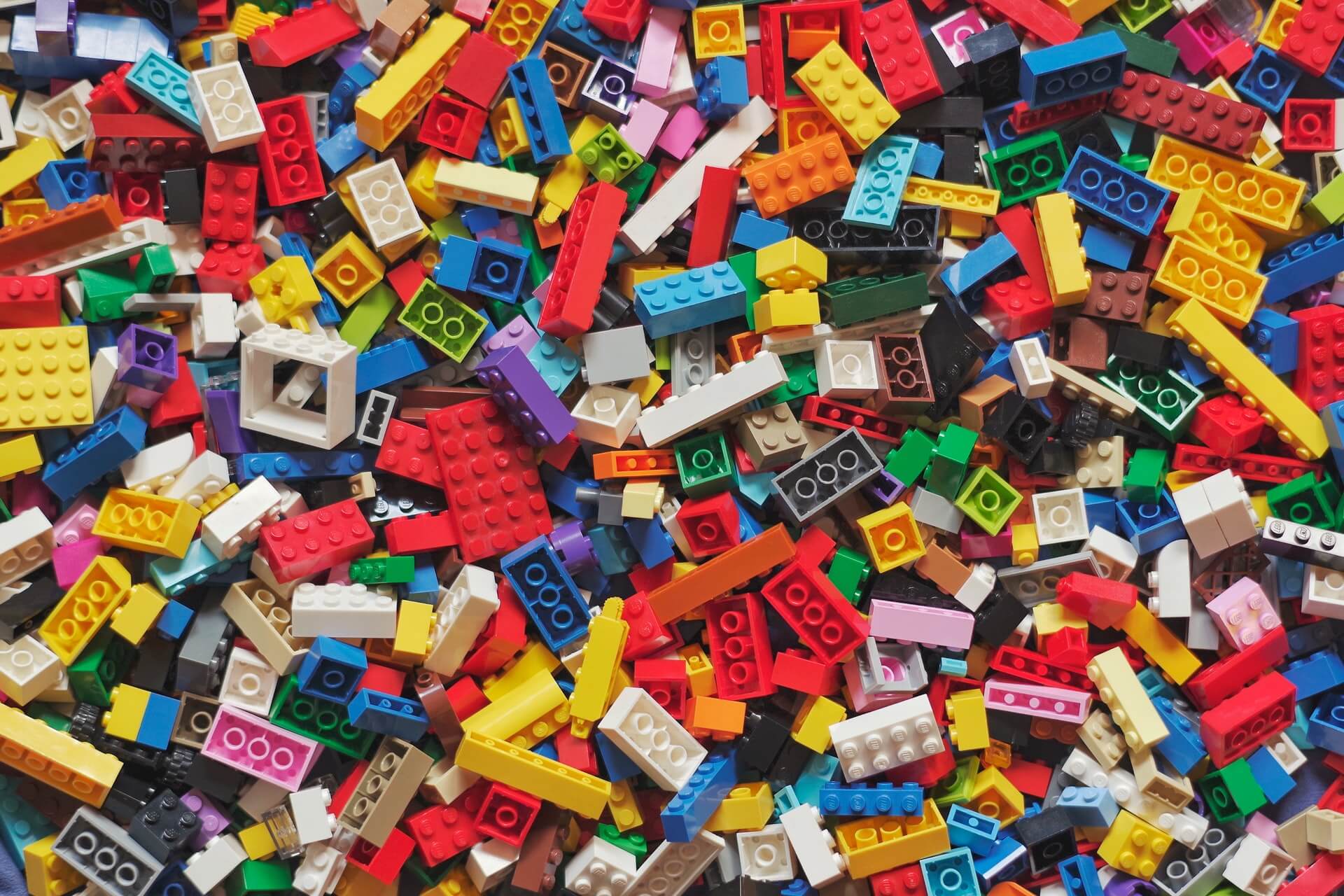 Assortment of LEGO bricks in different colors, sizes and shapes