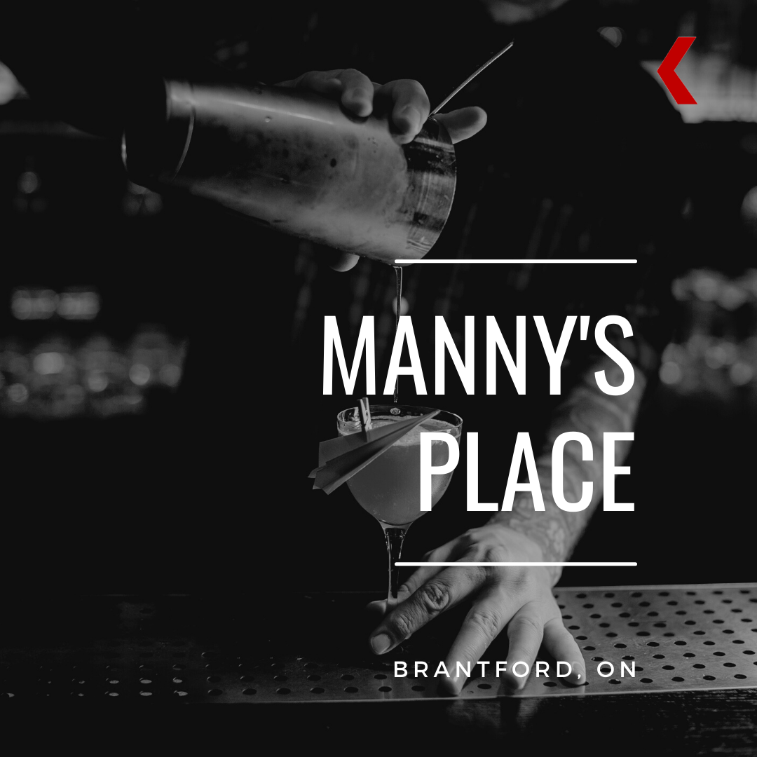 Bartender pouring a cocktail at Manny's Place
