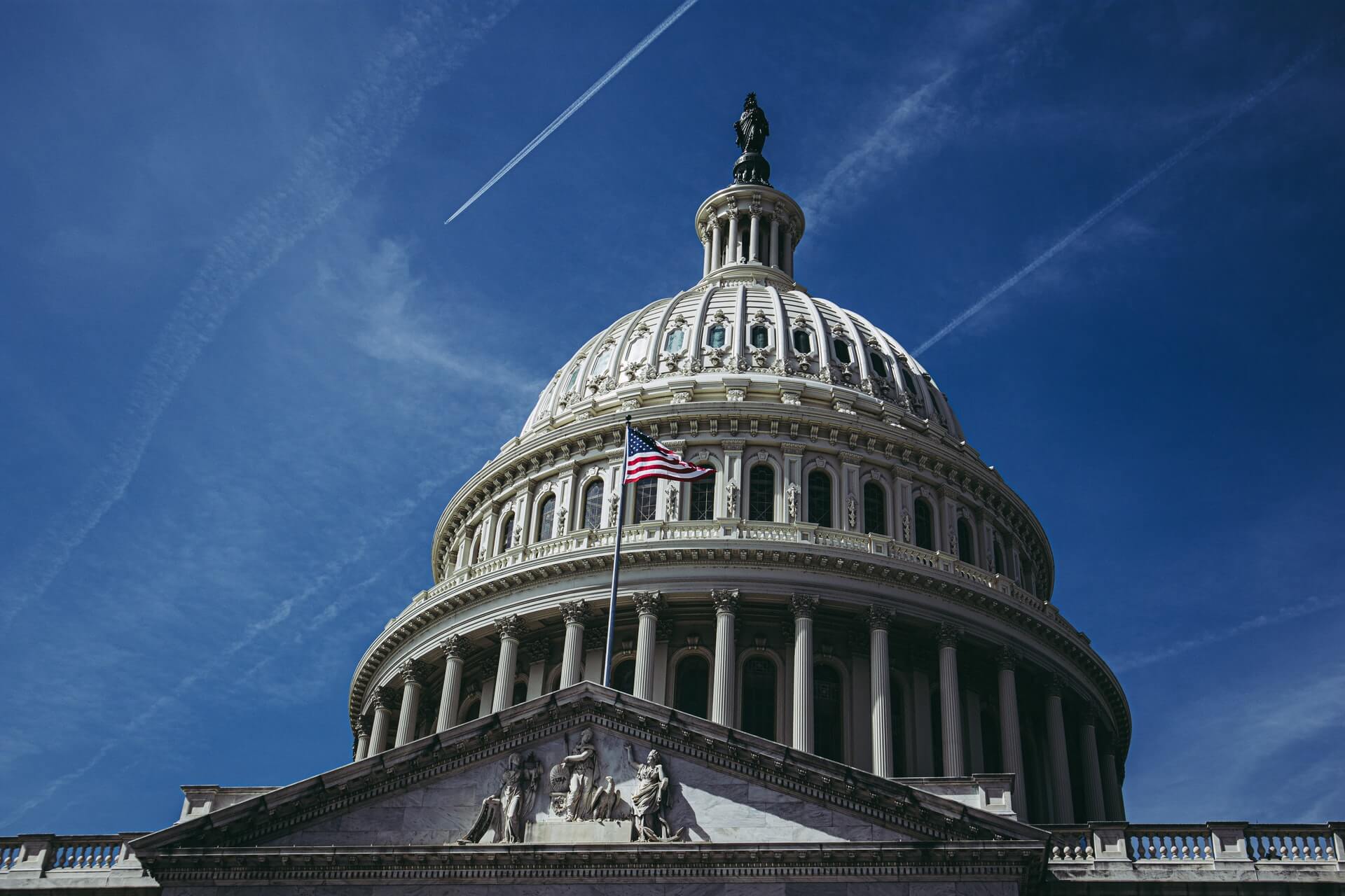 United States Capitol Building exterior and blue sky