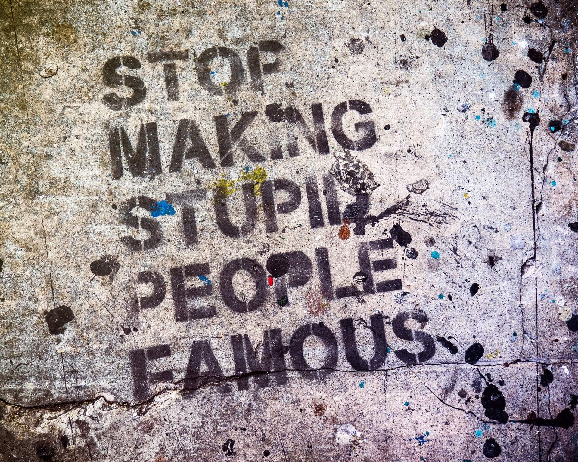 "Stop Making Stupid People Famous" graffiti