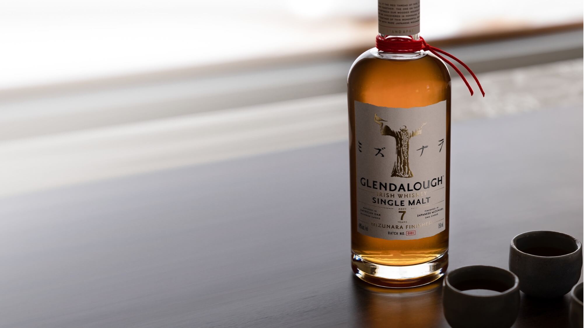 Glendalough Distillery 7 Years Mizunara single malt Irish whiskey and glasses