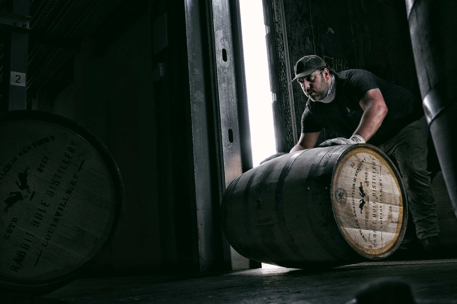 Rabbit Hole bourbon barrel rolling into rickhouse