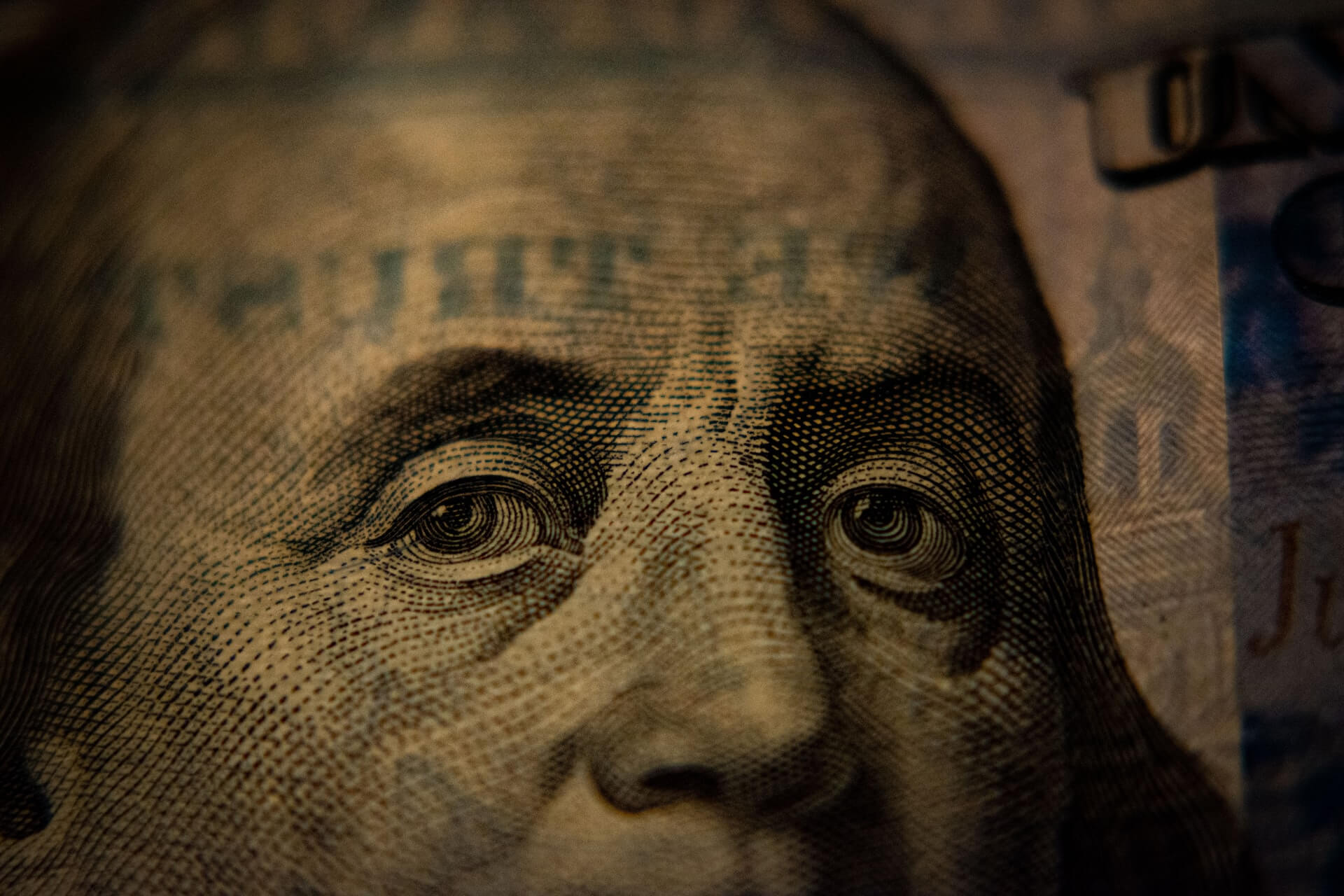 Closeup of Ben Franklin on $100 bill