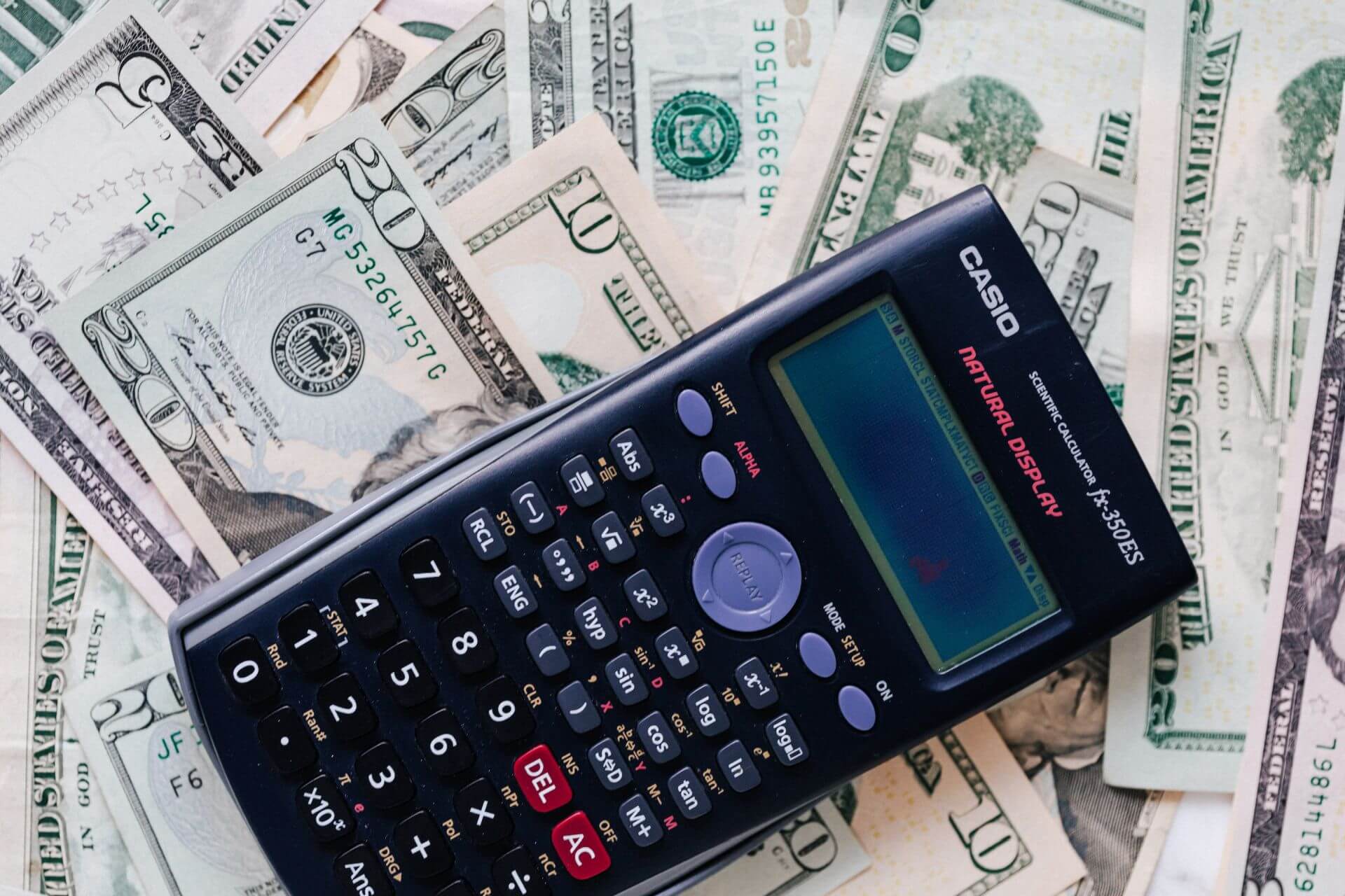 Scientific calculator on top of cash