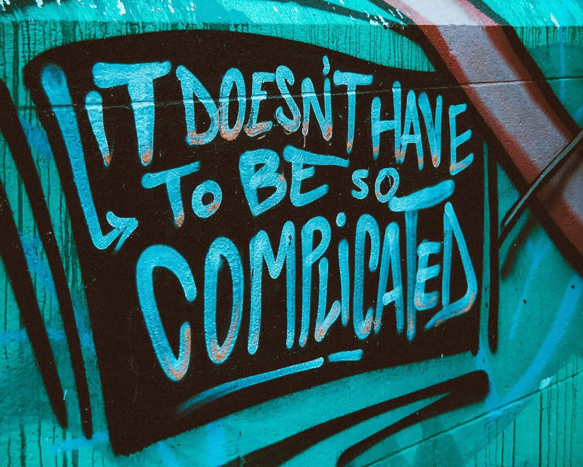 Graffiti that reads, "It doesn't have to be so complicated"