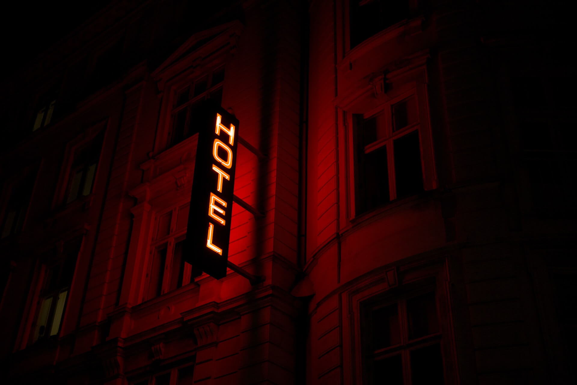 Red neon "hotel" sign in Copenhagen