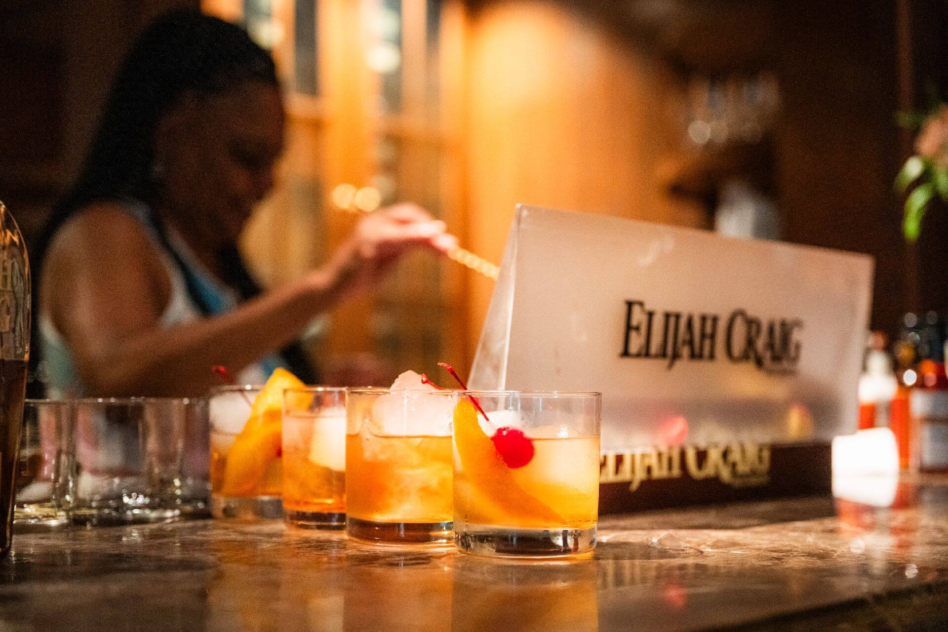 Lynn House making Old Fashioned cocktails for Elijah Craig
