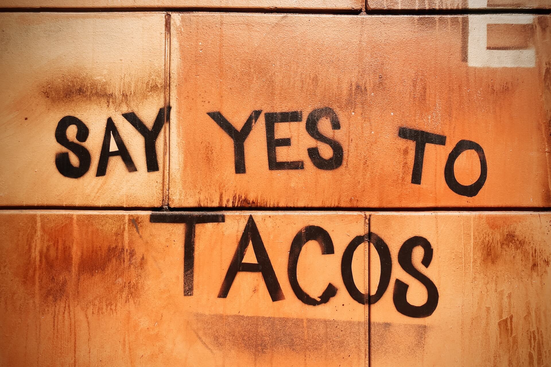 "Say yes to tacos" graffiti