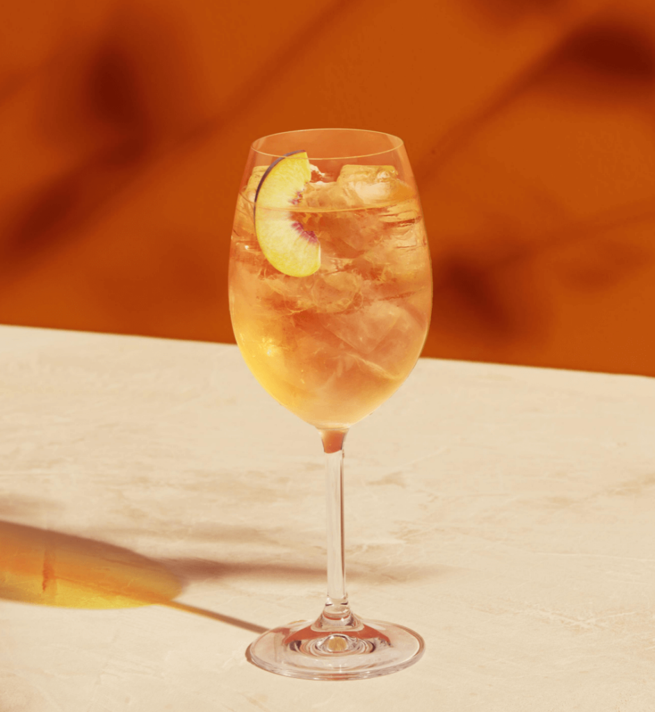 Peach Spritzer cocktail, also known as Greek Spritzer