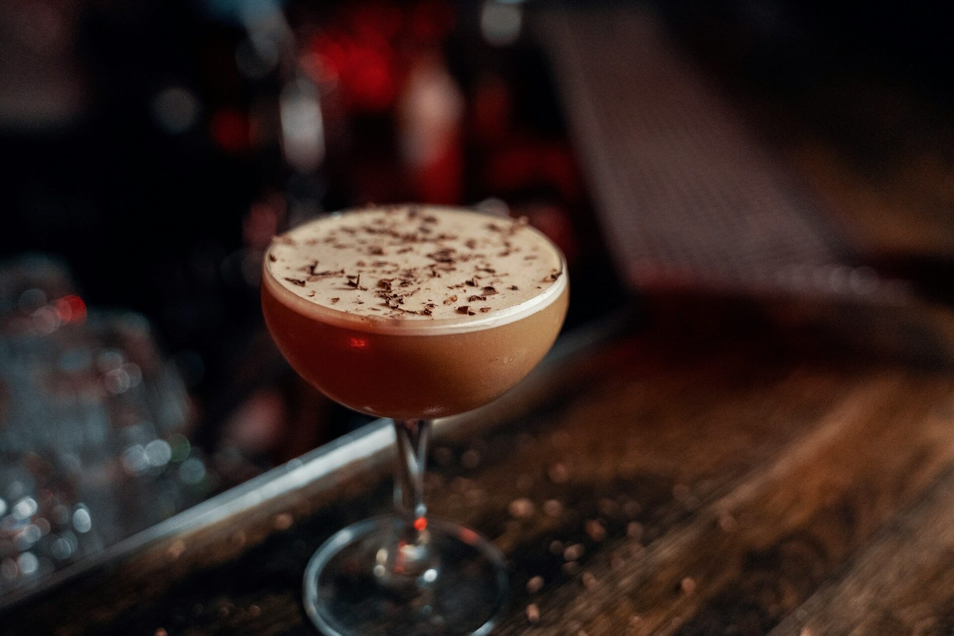 A coffee cocktail sitting on top of a bar