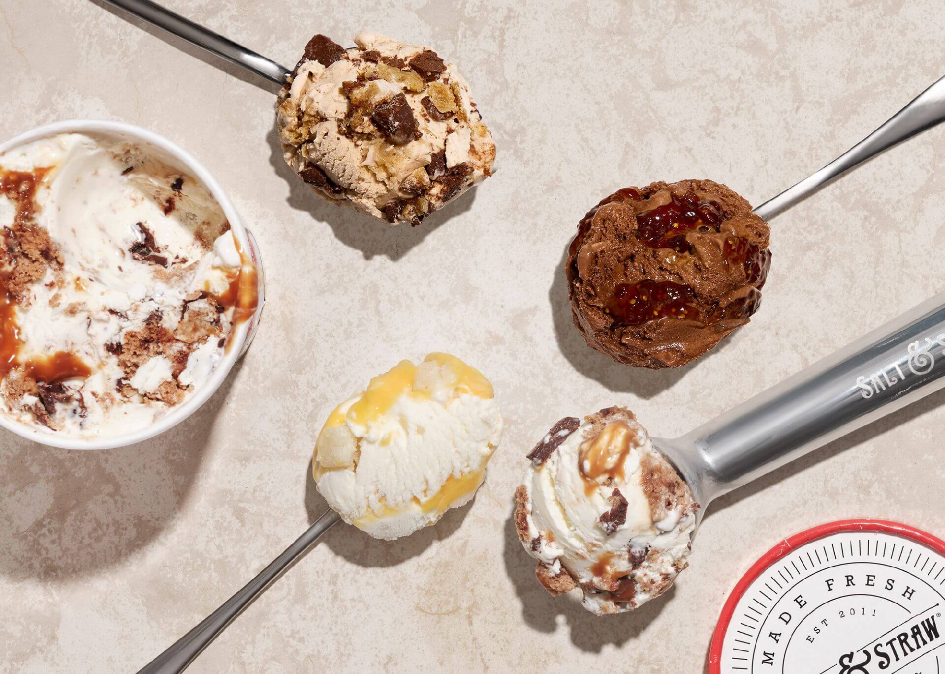 Scoops of Salt & Straw's 2024 Upcycled Food Series ice cream flavors